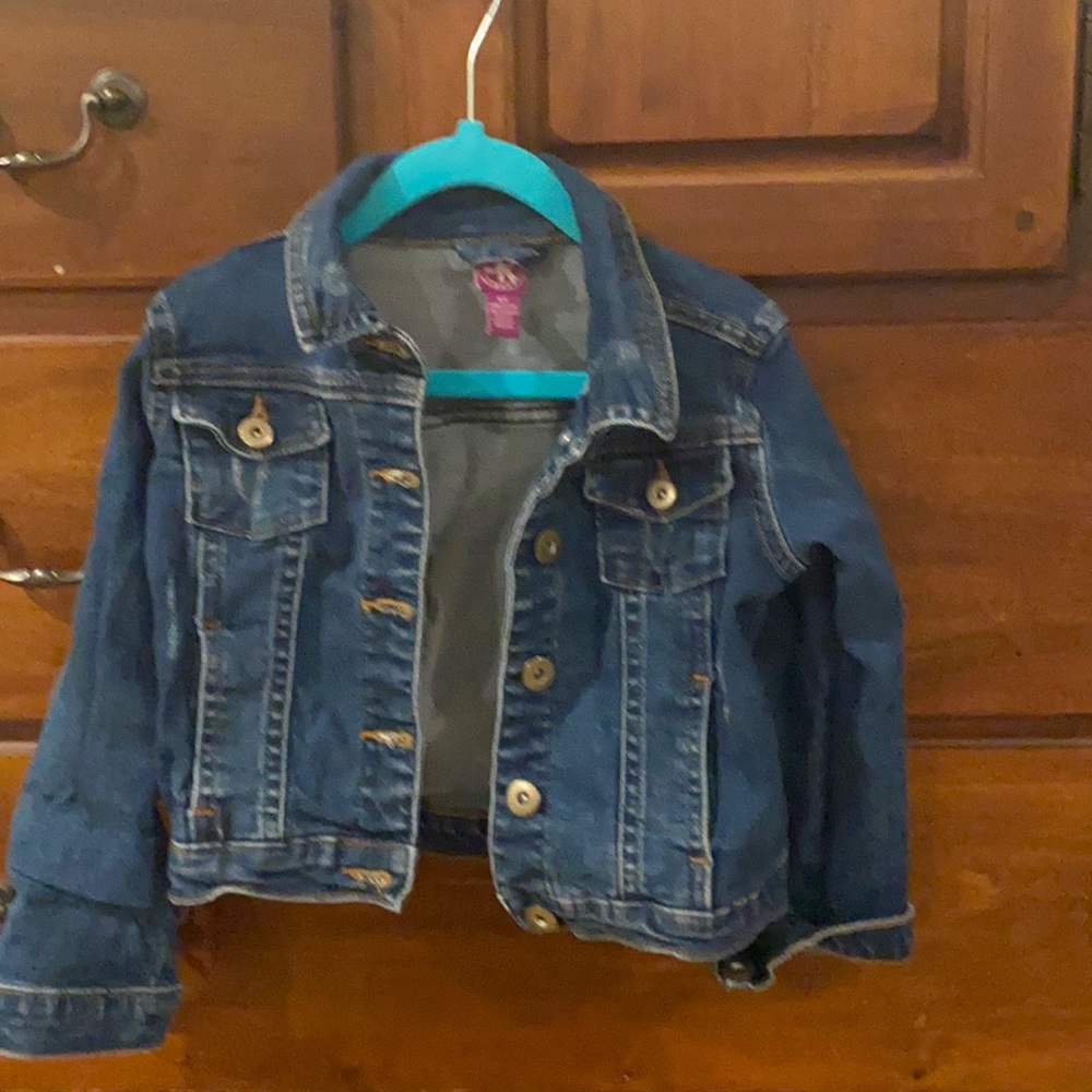 Distressed denim jacket